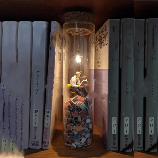 Diorama en Tubo de Ensayo "El lector" con Luz